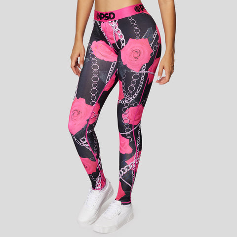3/4th view of black women's leggings with neon pink rose print and chains | PSD New Zealand