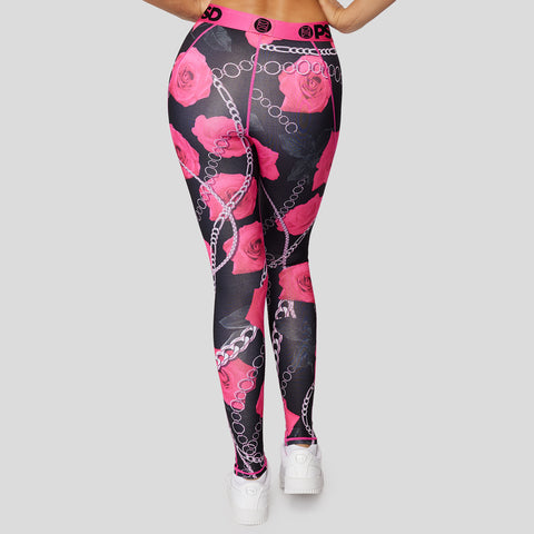 back view of black women's leggings with neon pink rose print and chains | PSD New Zealand