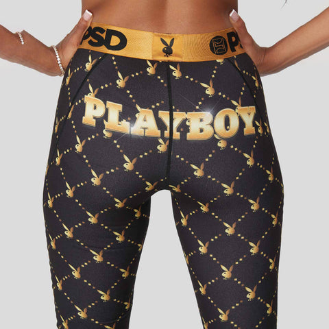 back zoom in of woman wearing black playboy underwear lux design women's leggings | New Zealand